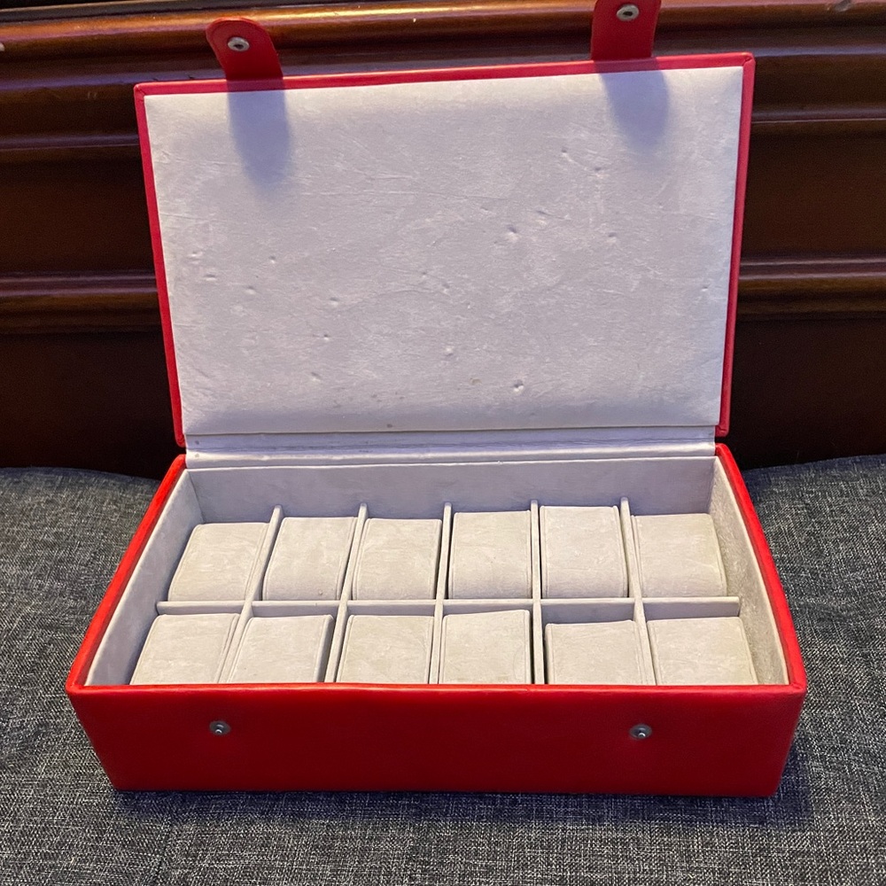 Red Jewelry / Watch Organizer Box

Hold 12 watches
Clean
Great condition